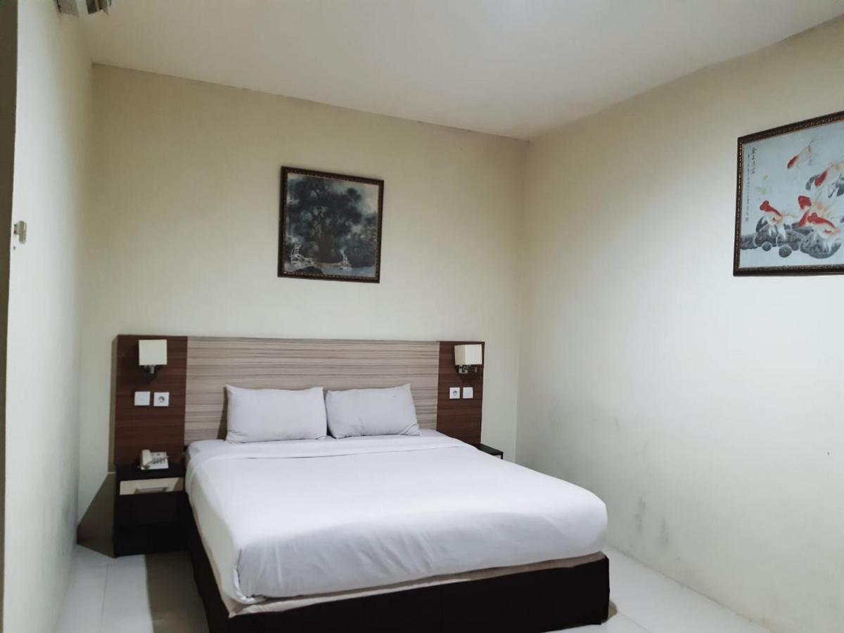 Agraha Andalas Hotel Макасар Екстериор снимка
